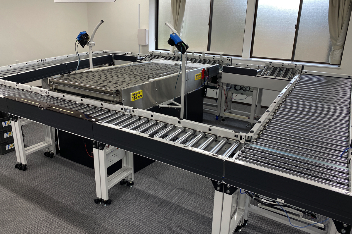 アイテム荷捌き・スキャニング<br />
オーダー集品システム